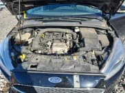 ✅ 2018 Ford Focus SE • VIN: 1FADP3FE7JL210442 • Lot: 90949905. Listed on Copart with 85,690 mi. Free auction sales archive from the USA and detailed vehicle history report at DreamBid. Image 11.