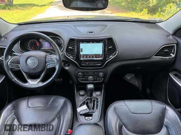 ✅ 2019 Jeep Cherokee Limited • VIN: 1C4PJMDX7KD218619 • Lot: 62240225. Listed on Copart with 143,944 mi. Free auction sales archive from the USA and detailed vehicle history report at DreamBid. Image 9.