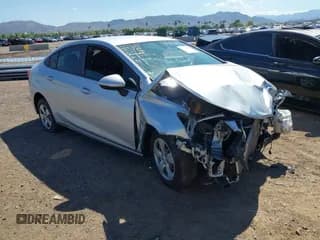 ✅ 2018 Chevrolet Cruze LS • VIN: 1G1BC5SM7J7141792 • Lot: 43334627. Listed on IAAI with 71,152 mi. Free auction sales archive from the USA and detailed vehicle history report at DreamBid. Image 1.