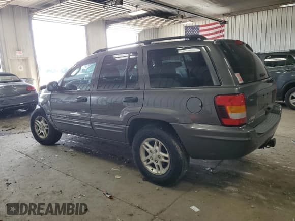 ✅ 2002 Jeep Grand Cherokee Laredo • VIN: 1J4GW48N92C321356 • Lot: 67315825. Listed on Copart with 112,829 mi. Free auction sales archive from the USA and detailed vehicle history report at DreamBid. Image 2.