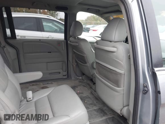 ✅ 2007 Honda Odyssey EX-L • VIN: 5FNRL38617B021380 • Лот: 43556943. Опубликован ранее на IAAI с пробегом 153 486 миль. Бесплатный доступ к архиву аукционных продаж из США и подробный отчёт об истории автомобиля на DreamBid. Изображение 8.