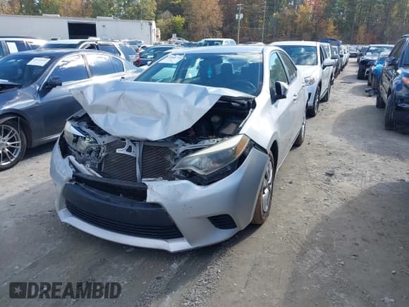 ✅ 2014 Toyota Corolla LE • VIN: 2T1BURHE7EC116035 • Lot: 43590718. Listed on IAAI with 107,399 mi. Free auction sales archive from the USA and detailed vehicle history report at DreamBid. Image 2.