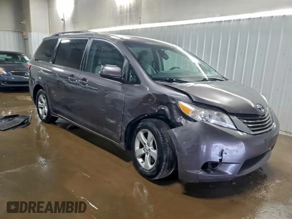 ✅ 2015 Toyota Sienna LE • VIN: 5TDKK3DCXFS594644 • Lot: 93735515. Listed on Copart with 106,597 mi. Free auction sales archive from the USA and detailed vehicle history report at DreamBid. Image 4.