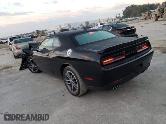 ✅ 2019 Dodge Challenger GT • VIN: 2C3CDZKG5KH690461 • Lot: 65984542. Wystawiony na Copart z przebiegiem 47 377 mil mil. Skorzystaj z bezpłatnego archiwum sprzedaży aukcyjnych z USA i zobacz szczegółowy raport historii pojazdu na DreamBid. Zdjęcie 3.