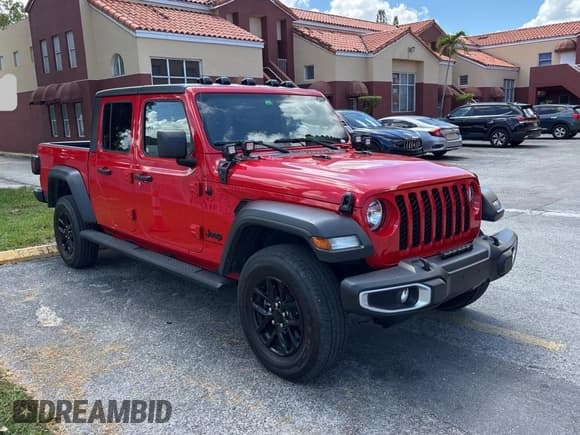 ✅ 2023 Jeep Gladiator Willys • VIN: 1C6HJTAG0PL560856 • Lot: 69775975. Listed on Copart with 29,153 mi. Free auction sales archive from the USA and detailed vehicle history report at DreamBid. Image 1.