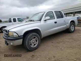 2002 Dodge Dakota Sport с VIN 1B7HL38N22S668501, выставлен на аукционе Copart как лот 50842275 с пробегом 224 264 миль миль и Списание • Salvage title. История ставок и продаж доступна на DreamBid. Изображение 1.