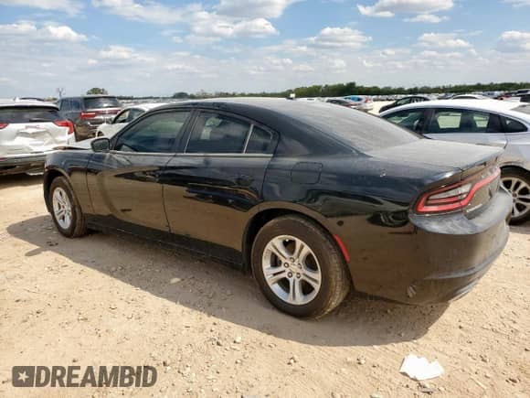 2022 Dodge Charger SXT with VIN 2C3CDXBG6NH208296, listed as a Copart auction lot 80763365 with 60,288 mi miles and Salvage title. Bid and sale history available at DreamBid. Image 2.