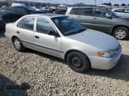 ✅ 2000 Toyota Corolla VE • VIN: 1NXBR12EXYZ398752 • Лот: 84564935. Опубликован ранее на Copart с пробегом 262 334 миль. Бесплатный доступ к архиву аукционных продаж из США и подробный отчёт об истории автомобиля на DreamBid. Изображение 4.