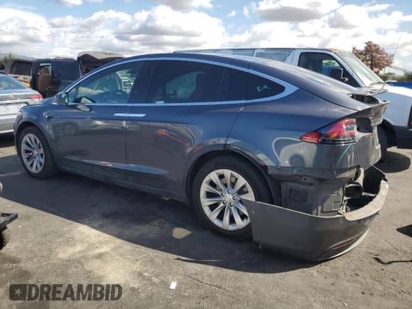 ✅ 2019 Tesla Model X 75D • VIN: 5YJXCBE28KF181039 • Lot: 84561745. Listed on Copart with 91,127 mi. Free auction sales archive from the USA and detailed vehicle history report at DreamBid. Image 2.
