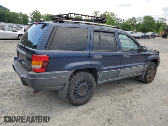 ✅ 2004 Jeep Grand Cherokee Laredo • VIN: 1J4GW48S64C160831 • Lot: 61920005. Wystawiony na Copart z przebiegiem 135 243 mil. Bezpłatny archiwum sprzedaży aukcyjnych z USA i szczegółowy raport historii pojazdu na DreamBid. Zdjęcie 3.