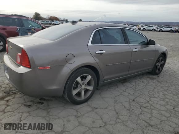 ✅ 2012 Chevrolet Malibu 1LT • VIN: 1G1ZC5E06CF144165 • Lot: 80795294. Listed on Copart with 131,459 mi. Free auction sales archive from the USA and detailed vehicle history report at DreamBid. Image 3.