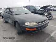 ✅ 1994 Toyota Camry LE • VIN: 4T1GK12E7RU057451 • Лот: 42417533. Опубликован ранее на IAAI с пробегом 421 184 миль. Бесплатный доступ к архиву аукционных продаж из США и подробный отчёт об истории автомобиля на DreamBid. Изображение 1.