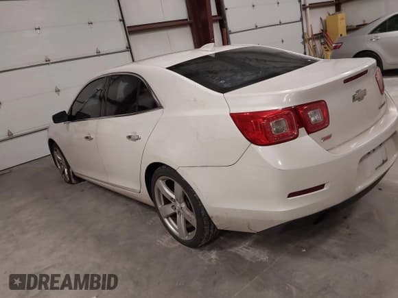 ✅ 2015 Chevrolet Malibu LTZ • VIN: 1G11G5SX1FF128902 • Lot: 43594997. Listed on IAAI with 105,886 mi. Free auction sales archive from the USA and detailed vehicle history report at DreamBid. Image 3.