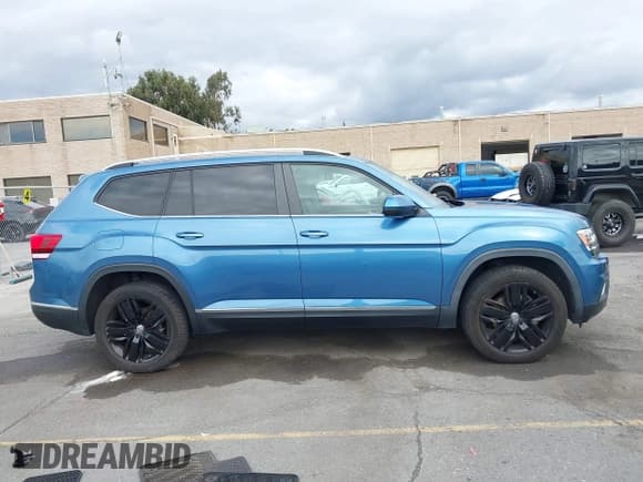 ✅ 2019 Volkswagen Atlas SEL • VIN: 1V2ER2CA9KC603024 • Lot: 43441615. Wystawiony na IAAI z przebiegiem 89 555 mil. Bezpłatny archiwum sprzedaży aukcyjnych z USA i szczegółowy raport historii pojazdu na DreamBid. Zdjęcie 13.
