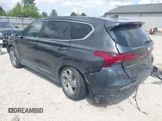 2021 Hyundai Santa Fe SE with VIN 5NMS14AJ4MH322800, listed as a IAAI auction lot 42923868 with 104,124 mi miles and . Bid and sale history available at DreamBid. Image 3.