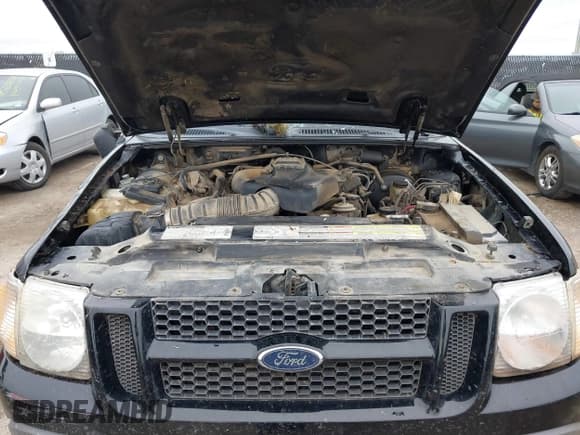 ✅ 2001 Ford Explorer Sport Trac • VIN: 1FMZU67E51UA90784 • Lot: 41557485. Wystawiony na IAAI z przebiegiem 290 670 mil. Bezpłatny archiwum sprzedaży aukcyjnych z USA i szczegółowy raport historii pojazdu na DreamBid. Zdjęcie 10.