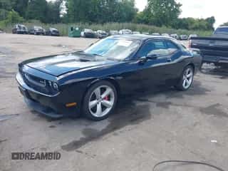 2010 Dodge Challenger SRT-8 z VIN 2B3CJ7DW1AH208758, wystawiony jako IAAI lot #43107005 z przebiegiem 83 052 mil mil oraz . Historia ofert i sprzedaży dostępna na DreamBid. Obrazek 2.