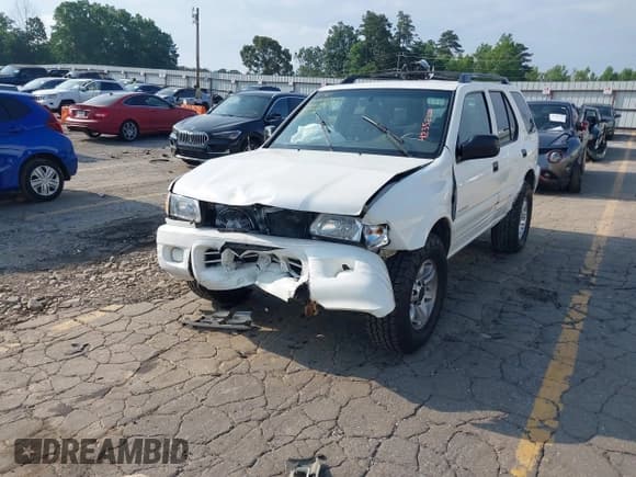 ✅ 2002 Isuzu Rodeo S • VIN: 4S2CK58W524321108 • Lot: 42352330. Listed on IAAI with 270,614 mi. Free auction sales archive from the USA and detailed vehicle history report at DreamBid. Image 18.