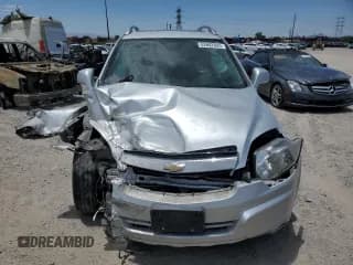 ✅ 2013 Chevrolet Captiva Sport LT • VIN: 3GNAL3EK9DS634629 • Lot: 62682605. Wystawiony na Copart z przebiegiem 187 891 mil. Bezpłatny archiwum sprzedaży aukcyjnych z USA i szczegółowy raport historii pojazdu na DreamBid. Zdjęcie 5.