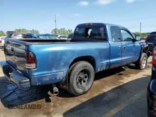 2002 Dodge Dakota Sport z VIN 1B7GG32NX2S616395, wystawiony jako Copart lot #70294944 z przebiegiem 205 067 mil mil oraz Czysty tytuł • Clean title. Historia ofert i sprzedaży dostępna na DreamBid. Obrazek 3.