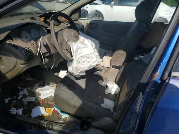 2005 Dodge Neon SXT z VIN 1B3ES56C05D181374, wystawiony jako Copart lot #57707425 z przebiegiem Nie podano mil oraz Szkoda całkowita • Salvage title. Historia ofert i sprzedaży dostępna na DreamBid. Obrazek 7.