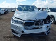 ✅ 2015 BMW X5 sDrive35i • VIN: 5UXKR2C5XF0H38920 • Lot: 43251474. Listed on IAAI with 130,812 mi. Free auction sales archive from the USA and detailed vehicle history report at DreamBid. Image 12.