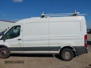 ✅ 2019 Ford Transit • VIN: 1FTYR2CM7KKA69374 • Lot: 43699024. Listed on IAAI with 243,820 mi. Free auction sales archive from the USA and detailed vehicle history report at DreamBid. Image 14.