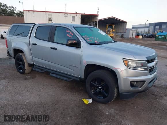 2018 Chevrolet Colorado 2WD LT z VIN 1GCGSCEN2J1229807, wystawiony jako IAAI lot #43391851 z przebiegiem 88 766 mil mil oraz . Historia ofert i sprzedaży dostępna na DreamBid. Obrazek 1.