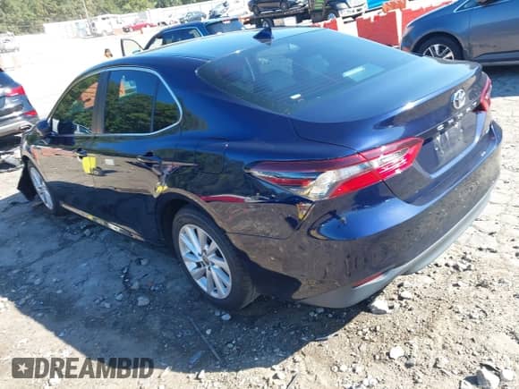 2021 Toyota Camry LE with VIN 4T1C11AK8MU461036, listed as a IAAI auction lot 43351796 with 83,856 mi miles and . Bid and sale history available at DreamBid. Image 3.