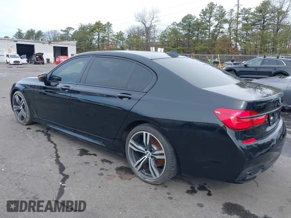 ✅ 2019 BMW 7 Series 740i • VIN: WBA7E2C57KB217973 • Lot: 39064321. Listed on IAAI with 54,818 mi. Free auction sales archive from the USA and detailed vehicle history report at DreamBid. Image 3.