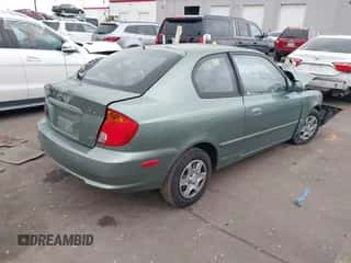 2003 Hyundai Accent GL z VIN KMHCG35C53U256981, wystawiony jako IAAI lot #41317375 z przebiegiem 73 522 mil mil oraz . Historia ofert i sprzedaży dostępna na DreamBid. Obrazek 4.