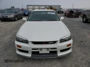 ✅ 1998 Nissan Skyline • VIN: ER34005709 • Lot: 86591154. Wystawiony na Copart z przebiegiem Nie podano. Bezpłatny archiwum sprzedaży aukcyjnych z USA i szczegółowy raport historii pojazdu na DreamBid. Zdjęcie 5.