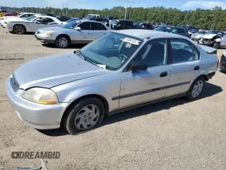 ✅ 1997 Honda Civic LX • VIN: 2HGEJ6675VH579999 • Lot: 87384135. Listed on Copart with 129,252 mi. Free auction sales archive from the USA and detailed vehicle history report at DreamBid. Image 1.