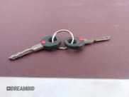 ✅ 1988 Mercedes-Benz 560 SL • VIN: WDBBA48D0JA077921 • Лот: 41450795. Опубликован ранее на IAAI с пробегом 155 749 миль. Бесплатный доступ к архиву аукционных продаж из США и подробный отчёт об истории автомобиля на DreamBid. Изображение 11.