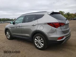 ✅ 2018 Hyundai Santa Fe Limited • VIN: 5XYZUDLA4JG549784 • Лот: 70005283. Опубликован ранее на Copart с пробегом 47 686 миль. Бесплатный доступ к архиву аукционных продаж из США и подробный отчёт об истории автомобиля на DreamBid. Изображение 2.