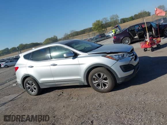 2016 Hyundai Santa Fe z VIN 5XYZTDLB8GG351827, wystawiony jako IAAI lot #43425613 z przebiegiem 145 079 mil mil oraz . Historia ofert i sprzedaży dostępna na DreamBid. Obrazek 14.