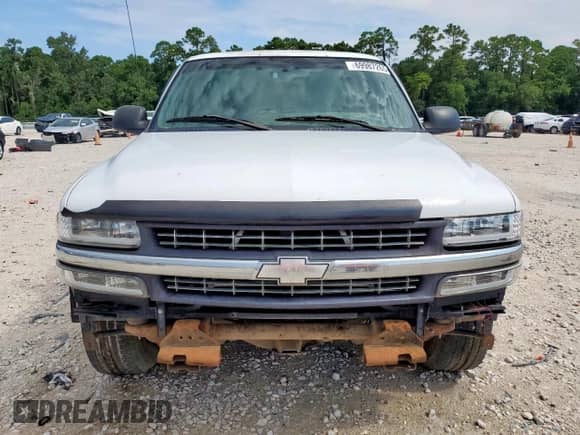 2002 Chevrolet Silverado 1500 with VIN 1GCEC14W32Z284577, listed as a Copart auction lot 69987265 with 504,167 mi miles and Salvage title. Bid and sale history available at DreamBid. Image 5.