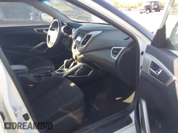 ✅ 2016 Hyundai Veloster • VIN: KMHTC6AD8GU280399 • Lot: 43714803. Listed on IAAI with 97,304 mi. Free auction sales archive from the USA and detailed vehicle history report at DreamBid. Image 5.