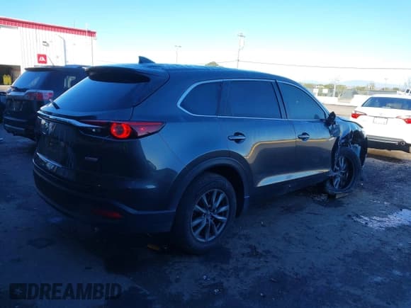 ✅ 2018 Mazda CX-9 Sport • VIN: JM3TCABY8J0203093 • Lot: 41218241. Listed on IAAI with 130,832 mi. Free auction sales archive from the USA and detailed vehicle history report at DreamBid. Image 4.