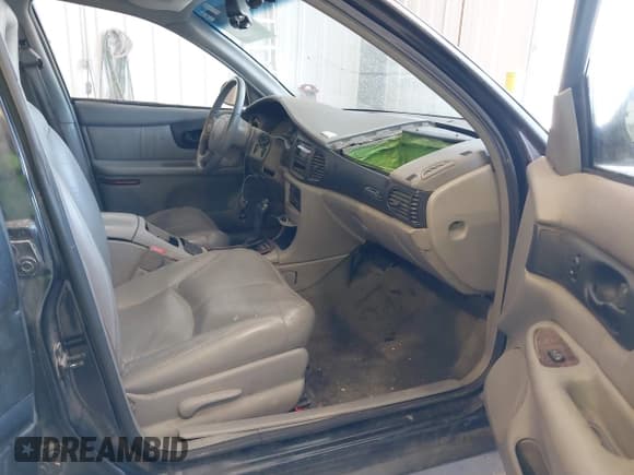 ✅ 2002 Buick Regal GS • VIN: 2G4WF551321136343 • Lot: 43002322. Listed on IAAI with 116,136 mi. Free auction sales archive from the USA and detailed vehicle history report at DreamBid. Image 5.