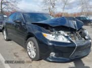 ✅ 2015 Lexus ES 330 • VIN: JTHBK1GG8F2210563 • Lot: 43671838. Listed on IAAI with 110,860 mi. Free auction sales archive from the USA and detailed vehicle history report at DreamBid. Image 1.