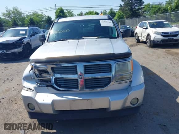 2008 Dodge Nitro SLT z VIN 1D8GT58K78W150268, wystawiony jako IAAI lot #42560600 z przebiegiem 139 749 mil mil oraz . Historia ofert i sprzedaży dostępna na DreamBid. Obrazek 12.