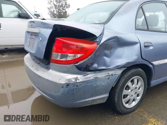 ✅ 2003 Kia Rio • VIN: KNADC125736223027 • Lot: 41797538. Listed on IAAI with 25,611 mi. Free auction sales archive from the USA and detailed vehicle history report at DreamBid. Image 6.