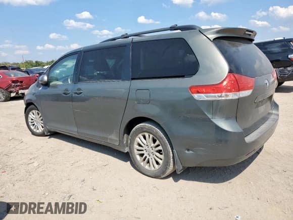 ✅ 2012 Toyota Sienna XLE • VIN: 5TDYK3DC8CS257279 • Lot: 84924515. Listed on Copart with 170,132 mi. Free auction sales archive from the USA and detailed vehicle history report at DreamBid. Image 2.