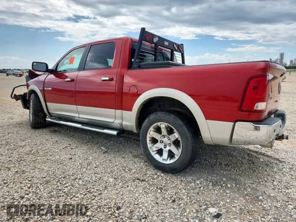 2010 Dodge 1500 Laramie с VIN 1D7RB1CT0AS177947, выставлен на аукционе Copart как лот 64126115 с пробегом 91 001 миль миль и Списание • Salvage title. История ставок и продаж доступна на DreamBid. Изображение 2.