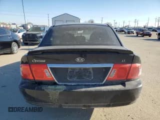 ✅ 2004 Kia Optima LX • VIN: KNAGD126545357660 • Лот: 42003885. Опубликован ранее на Copart с пробегом 164 694 миль. Бесплатный доступ к архиву аукционных продаж из США и подробный отчёт об истории автомобиля на DreamBid. Изображение 6.