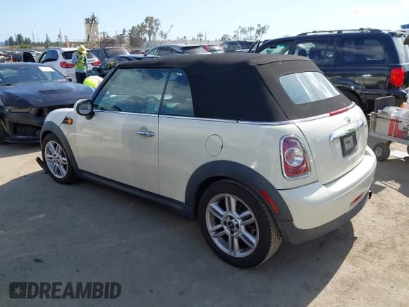 ✅ 2012 MINI Convertible • VIN: WMWZN3C53CT134194 • Lot: 42261686. Listed on IAAI with 104,099 mi. Free auction sales archive from the USA and detailed vehicle history report at DreamBid. Image 3.