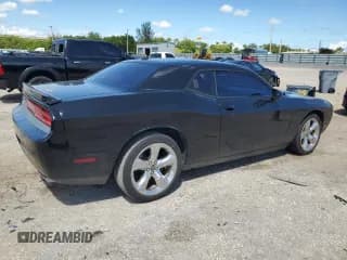 ✅ 2014 Dodge Challenger SXT • VIN: 2C3CDYAG6EH311502 • Lot: 72780224. Wystawiony na Copart z przebiegiem 91 551 mil. Bezpłatny archiwum sprzedaży aukcyjnych z USA i szczegółowy raport historii pojazdu na DreamBid. Zdjęcie 3.
