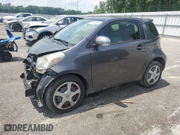 ✅ 2013 Scion iQ • VIN: JTNJJXB02DJ025968 • Lot: 57145365. Listed on Copart with 189,990 mi. Free auction sales archive from the USA and detailed vehicle history report at DreamBid. Image 1.