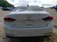2016 Hyundai Genesis 3.8L z VIN KMHGN4JE0GU107517, wystawiony jako Copart lot #72142564 z przebiegiem 115 744 mil mil oraz Szkoda całkowita • Salvage title. Historia ofert i sprzedaży dostępna na DreamBid. Obrazek 6.